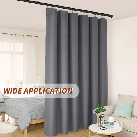 10-Foot Flexible Black Curtain Track System With Bendable Curved Rail For Ceiling Or Wall Mount, Sliding Track For Bay Window RV Room Dividers, Includes Brackets And Easy Fuss Installation. Installed on ceiling with gray room divider curtains.