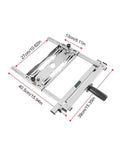 Machining vise with stainless steel frame, built-in ruler scales and hand crank; angled top view