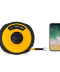 165 Feet Fiberglass Tape Measure With Dual Inch And Metric Scale next to smartphone for size comparison