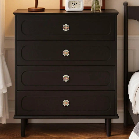 Vintage Crystal And Ceramic Drawer Knobs Featuring Bold Red Yellow Mosaic Tile Designs On Simple White Mounts on a dark dresser.