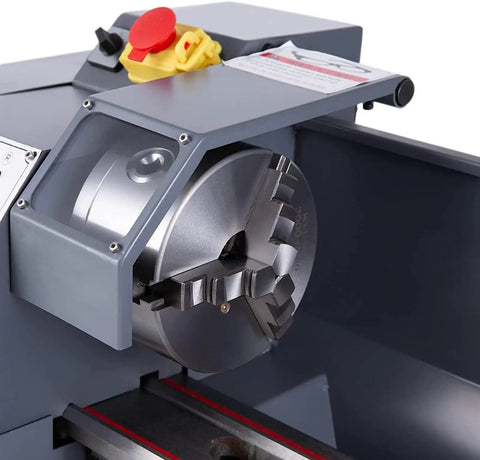 Close-up of Mini Metal Lathe Machine 1100W showing chuck and internal components, designed for precise milling and turning.