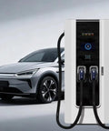 Ultra Fast DC EV Charger 80KW To 120KW Dual Connector Charging Station With App Control Level 3 Commercial Electric Vehicle Charger For Highway Rest Stops Easy Installation And Remote Monitoring shown next to a silver electric vehicle.