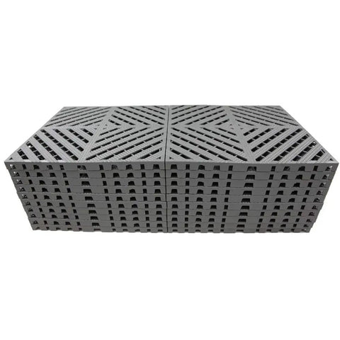Stack of gray modular interlocking deck tiles 13x13 inch heavy duty for garage floors car wash facilities indoor outdoor use