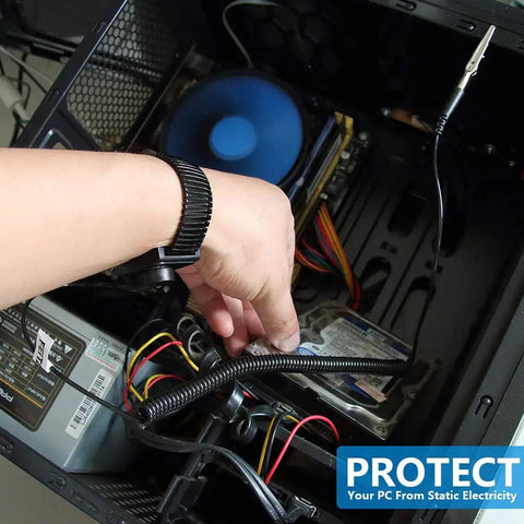 Hand wearing Anti Static ESD Adjustable Metal Wrist Strap With 8 Foot Coiled Cord inside computer case to prevent static damage.