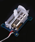 Premium Grade Micro Analog Servo For Ultralight RC Airplanes, Hella Snappy Linear Actuator showing motor and gears on black background.