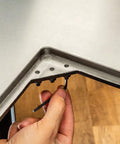 Adjusting hardware on 1-1/2 Inch Thick Cast Iron Router Table Top for smooth, sag-free routing and flat, vibration-free cutting surface