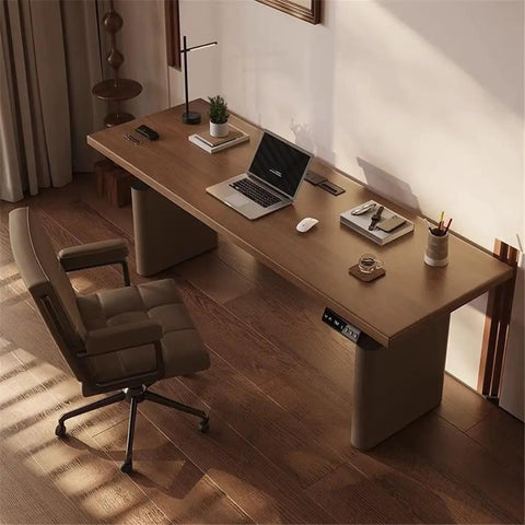 Premium Walnut Electric Standing Desk With Effortless Height Adjustment And Nifty USB Charging Ports For A Rock Solid Home Office Setup That Is A Total Game Changer For Your Daily Grind, viewed from above, with laptop and chair.