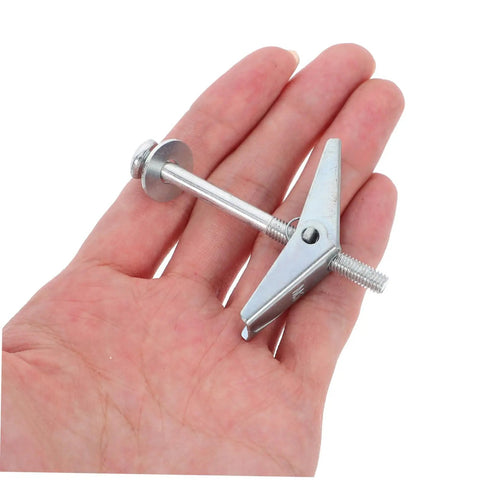 Hand holding Petal Expansion Screws Set M5x60mm For Hollow Walls Drywall Gypsum Board Round Head Toggle Bolts Kit