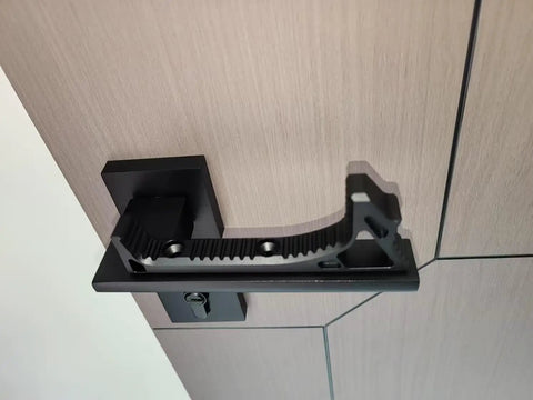 Slick Black Aluminum Door Handle Set Drop In Replacement With Threaded Mounting Hardware close-up view on a door.