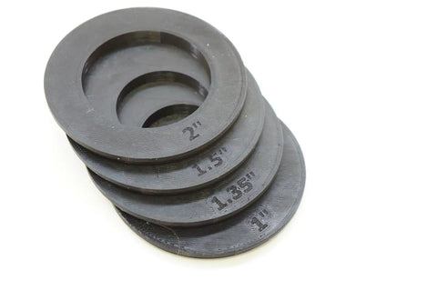 Four Piece Router Table Insert Ring Set Featuring Rock Solid 3.1 Inch Outer Diameter with inner sizes of 1, 1.35, 1.5, 2 inches.
