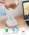 65W USB Power Strip With Surge Protection charging laptop on desk with dual USB ports and USB C, Quick Charge 3.0 PD feature.