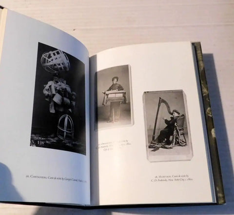 Open pages of 'Work And Mad Wanderings Street Life In The Machine Age Photographic Social History By Ken Appollo First Edition 108 Pages Used Book In Good Condition Perfect For Collectors', showing vintage photos.