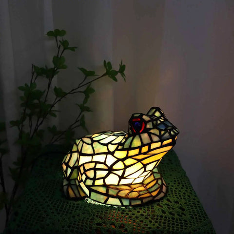 Frog Table Lamp Tiffany Style Stained Glass Accent Night Light for Home Decor, multicolor stained glass frog shining softly in dark room.