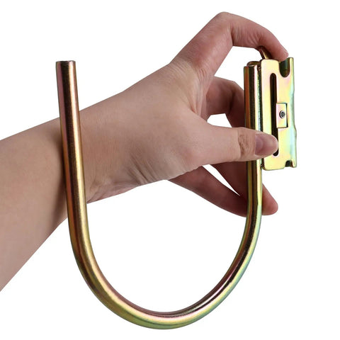Hand holding a part of the 8 Piece Heavy Duty E Track Hooks Set J And L Style For Cargo Tie Downs In Trucks Trailers And Vans With Spring Fittings Rust Resistant Steel Hangers For E Track And X Track Systems Gold.