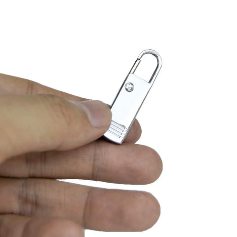 Person holding silver metal Zipper Pull Tab Replacement Metal Zipper Extender For Luggage Backpack And Suitcases Snap On Fix For Missing Pulls