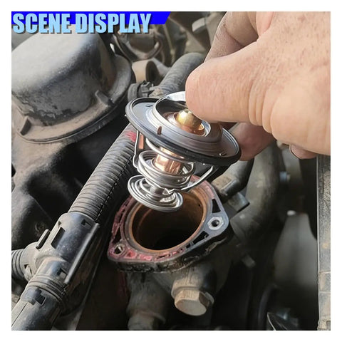 Built Tough Car Engine Coolant Thermostat With Gasket Offers Rock Solid Performance being installed in a truck engine.