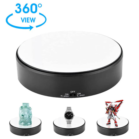 Mirror Surface Motorized Turntable Display Stand With 360 Degree Rotary Motion And Adjustable Speed showcasing a watch, statue, and figure.