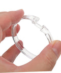 Close-up of hand holding a 24 Pack Transparent Shower Curtain Ring With Smooth Glide for easy sliding and durability.