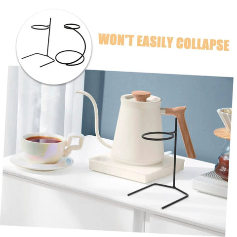Grab A Fresh Cup With This Premium Solid Metal Coffee Dripper Stand on a table beside a tea kettle and cup.
