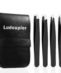 4 In 1 Tweezers Set With Travel Case, Pro Grade Stainless Steel Anti Rust Eyebrow Pluckers For Women And Men, Includes Flat, Angled, Pointed And Slant Tips For Facial Hair, Ingrown Hair, Eyebrow Grooming. Image of black leather case and four tweezers.