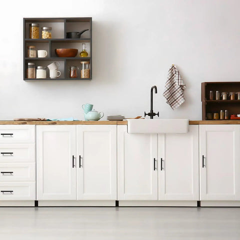 Kickass Matte Black Cabinet Pulls With 3 Inch Hole Centers Hella Sturdy Heavy Duty Stainless Steel Drawer Handles For Kitchen Cabinets And Modern Home Upgrades 30 Pack Set displayed in a modern white kitchen with farmhouse sink.