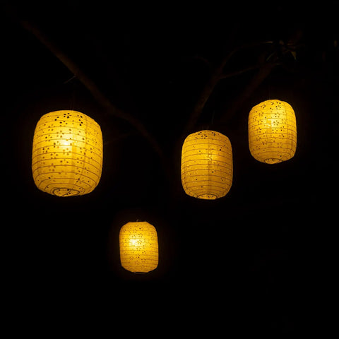 Lit Ten Pack White Paper Lanterns 6.3 Inch Oval Hollow Hanging Lanterns For Chinese Japanese Style Festive Decor