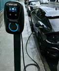 Beefed Up Level 2 EV Charger 48A 240V With 25 Ft Cable Hardwired ETL Listed For Tesla And J1772 EVs on street charging car