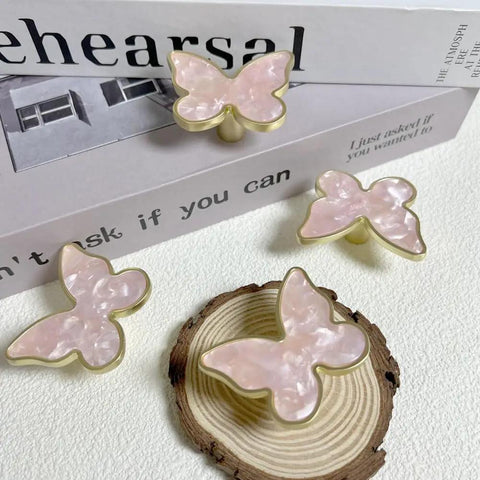 Pink Butterfly Shape Cabinet Knob Set Six Pack Handles for Cabinets, Drawers, Dressers, and Wardrobes on display