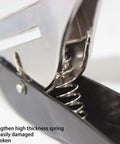 Close-up of Pro Grade Heavy Duty Single Hole Punch showing metal spring mechanism and ergonomic grip handle.