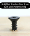 Close-up of Number 8 By 1 1/2 Inch Phillips Flat Wood Screw With Black Xylan Coated Stainless Steel for decking.