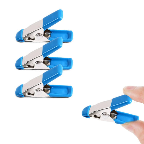 2 Inch Heavy Duty Spring Clamps Set 30 Pack For Woodworking Crafts Photography Backdrops Muslin Studio Clips Nickel Plated Steel With Non Marking PVC Coated Tips Pro Grade For Pros And DIYers, shown in hand