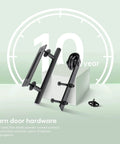 Black barn door hardware kit components including handles and pulleys displayed on a stand with a 10-year guarantee message.