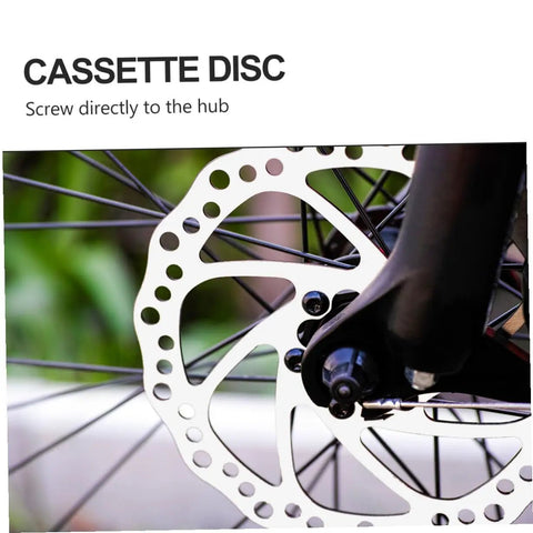 Bombproof Mechanical Disc Brake Rotor Kit For Mountain Bike Featuring Front And Rear 160 Mm Silver Rotors close-up of cassette disc on bike hub.