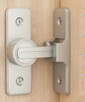 Heavy Duty Zinc Alloy Barn Door Lock Latch With 90 Degree Turn attached to wooden door, showing nickel finish and screws.