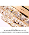 42 Inch Crystal Chandelier Ceiling Fan With Invisible Blades And Wall Control Featuring Slick Airflow And Top Shelf Led Illumination Offering Three Color Tint Options For A Gold Room Refresh close-up of polished square crystal lampshade.