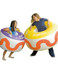 Two children playing with Belly Bumper 50 Inch Play Space For Kids Heavy Duty Vinyl Cushion With Two Handles Cushioned Safety for Fun