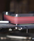 Heavy Duty Sanding Belts 6X89 Inches One Twenty Grit Aluminum Oxide Abrasive Paper for Belt Sanders in use on a detail sander.