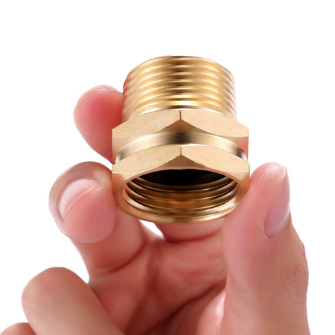Close-up of the Two Pack Brass Garden Hose Adapter 3/4 GHT Female to 3/4 NPT Male Connector held by hand