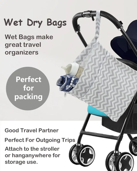 Waterproof Wet Dry Bag Set For Cloth Diapers And Swimwear on stroller, two zippered pockets, durable polyester with handle.