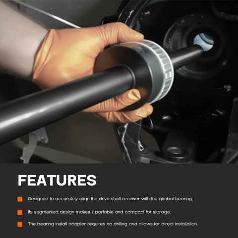 Gimbal bearing alignment tool kit, silver ring on black drive shaft, being installed in a boat outdrive