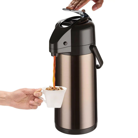 Upgraded Airpot Coffee Carafe With Double Pump Stainless Steel Drink Dispenser in use, serving hot beverage into cup