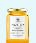 Fleur 12 oz jar of honey with label indicating 100% pure honey, batch No. 503, Spring Season '17, all natural ingredients.
