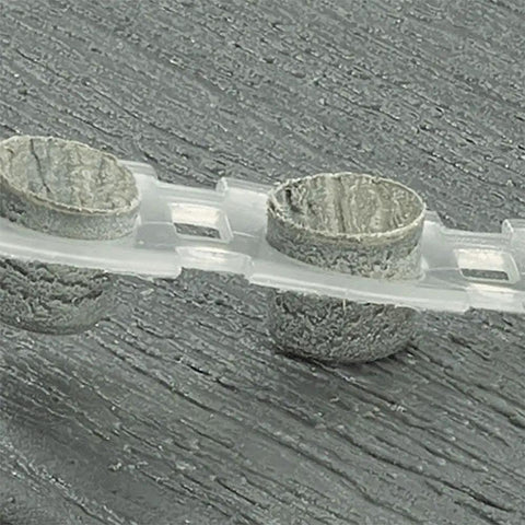 Collated Deck Screw Plugs 100 Linear Feet Select Saddle For Trex Decking showing two plugs in a clear tape strip.