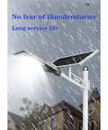 JUDYSSY Solar Street Lights Outdoor, waterproof solar flood light with solar panel under rain, designed for durability.