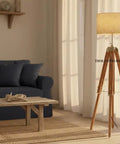 Living room setup with Vintage Teak Wood Tripod Floor Lamp with Chrome Finish 55 Inch Tall Nautical Inspired Rustic Modern Home Decor.