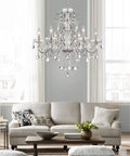 6 Light Crystal Chandelier With Chrome Finish Pendant Lighting For Dining Room Bedroom Living Room Raindrop Style LED Ready Height 23 Inches Diameter 24 Inches Adjustable Chain Up To 60 Inches hanging over living room sofa