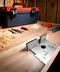 Top Shelf Aluminum Router Table Insert Plate Featuring Precision Accuracy Scale Hella Durable Aluminum Construction Perfect Fit For Custom Woodworking Bench Setups on workbench with tools.