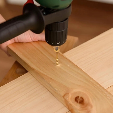 1 Inch Deck Screws Size 8 310 PC Epoxy Coated T25 Star Bit Outdoor Wood Decking Fence Screws being installed in lumber