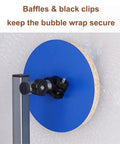 Baffles and black clips secure bubble wrap on Zero Fuss Wall Mount Bubble Wrap Dispenser With Heavy Duty Foam Roll Packer.