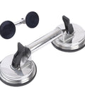 Heavy Duty Glass Suction Cup With Stainless Steel Handle For Lifting Heavy Tiles Smooth Panels And Glass Safe Non Slip Adhesion During Transport On Any Smooth Surface, showing two suction cups attached to steel handle.